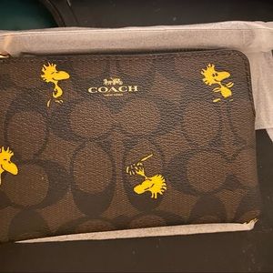 BNWT Coach Peanuts Woodstock Wristlet
